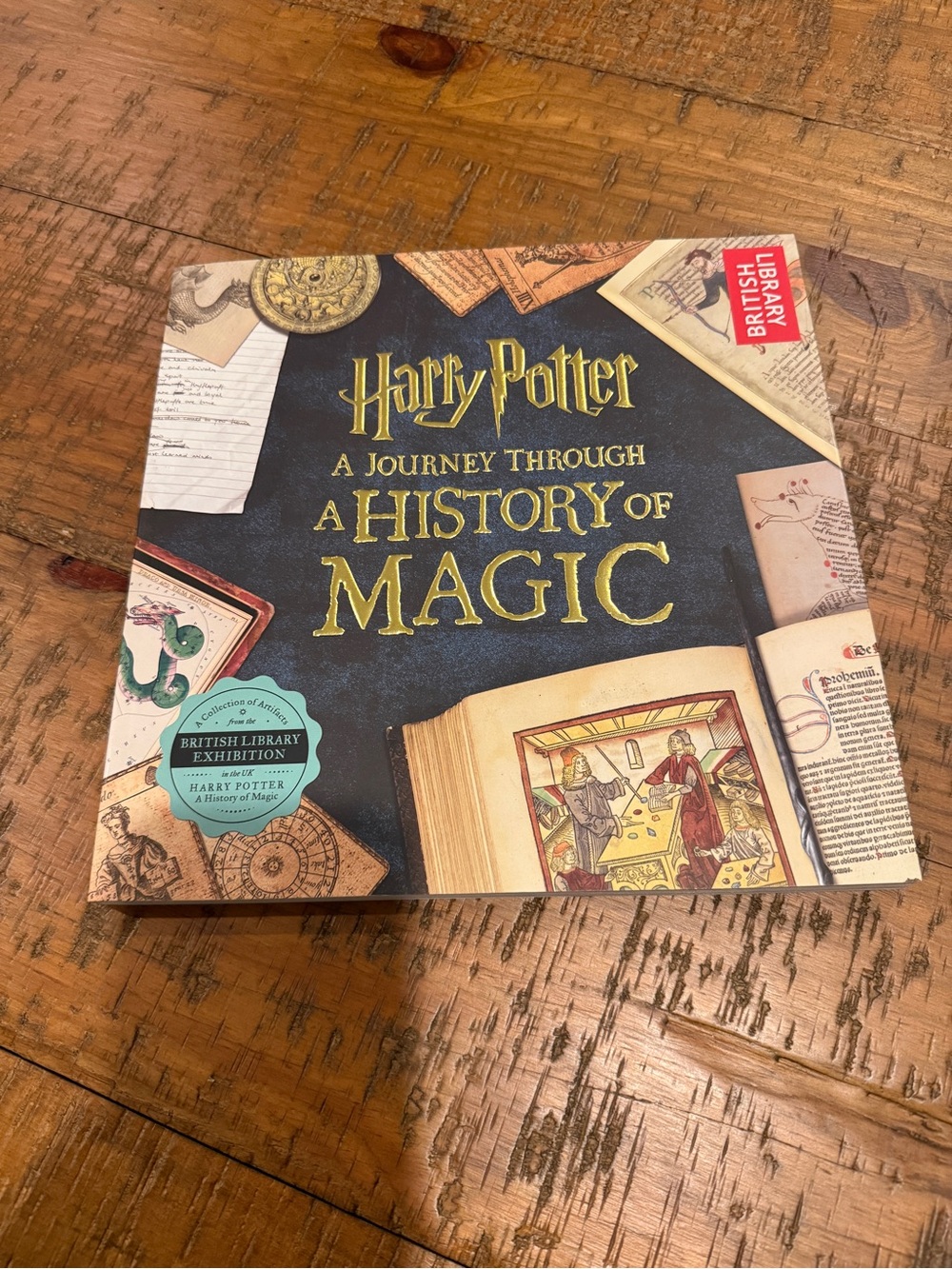 Harry Potter: A Journey Through A History of Magic Hardcover - Navy & Gold
